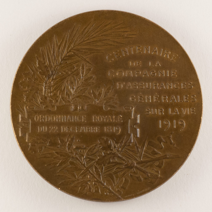 Medal Centenary of General Life Insurance Company - by R. Lamourdedieu - reverse
